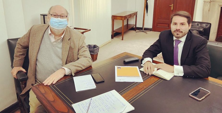Muñoz y el presidente del Servel, Andrés Tagle.